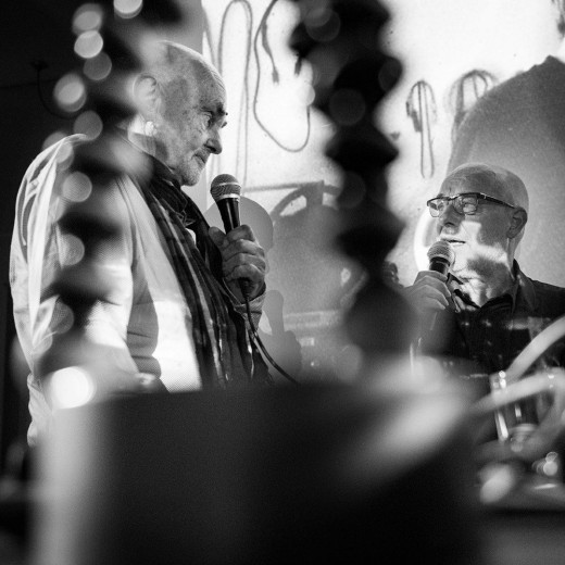 Hans-Joachim Roedelius with Brian Eno. Frankfurt 2015. by Clemens Mitscher Photography is art. Copyright holder for this art work: © Clemens Mitscher / VG Bild-Kunst, Bonn.